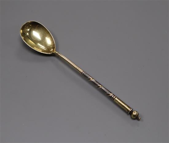 A 19th century Russian niello and silver-gilt spoon.